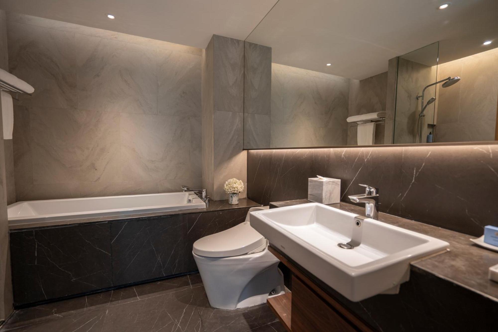 Walton Suites Sukhumvit Μπανγκόκ Δωμάτιο φωτογραφία