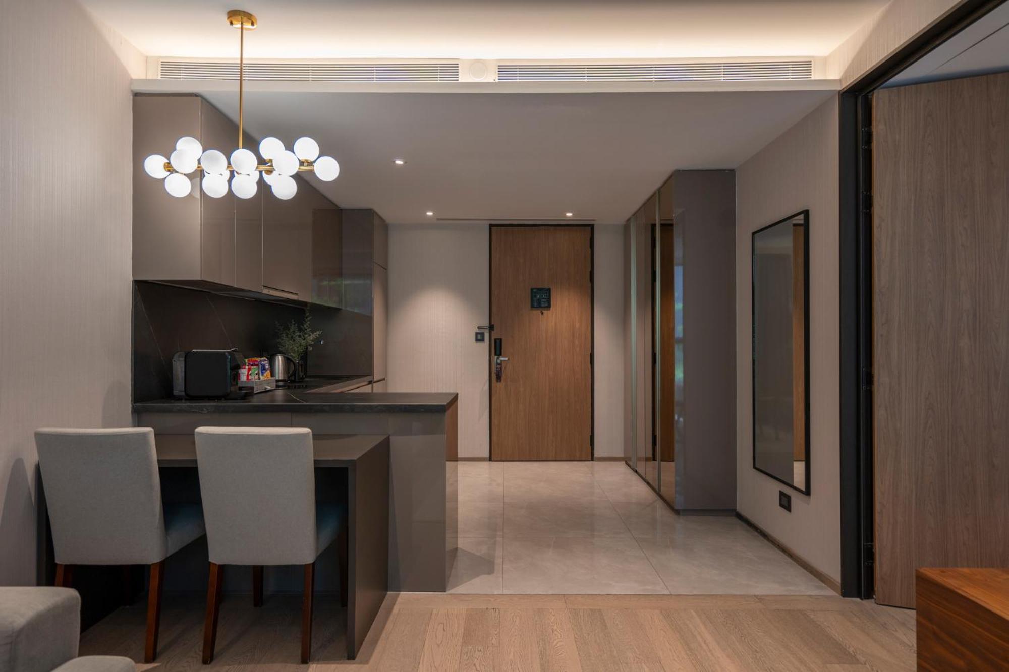 Walton Suites Sukhumvit Μπανγκόκ Δωμάτιο φωτογραφία
