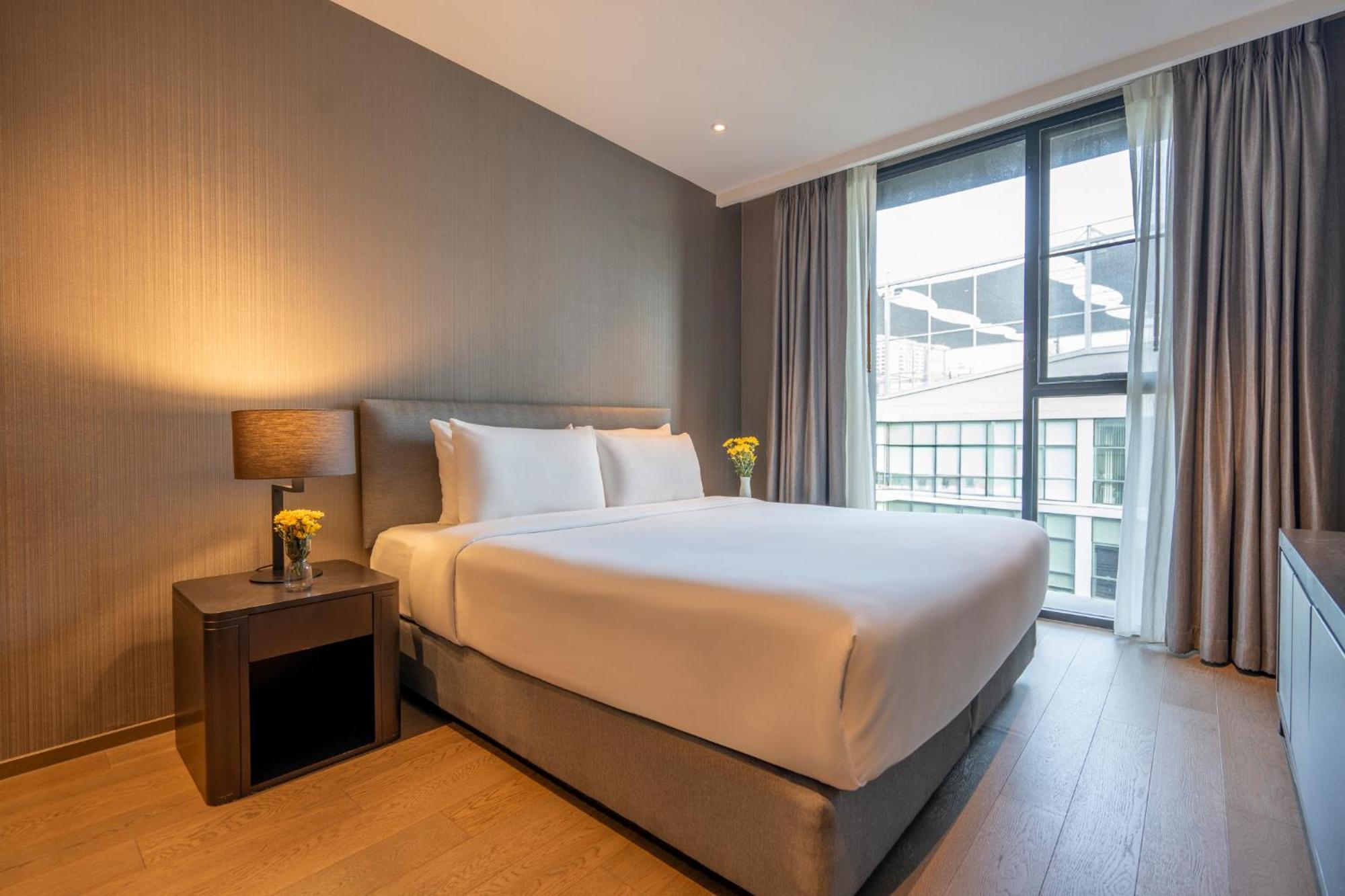 Walton Suites Sukhumvit Μπανγκόκ Δωμάτιο φωτογραφία